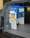 02_Sujeta maletines automático y estantes en Renault Kangoo