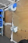 Scaffale con minuteria in contenitori trasparenti e cassetto nel Dokker