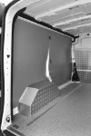 Panelado lado izquierdo con cubrerruedas y plataforma para Talento